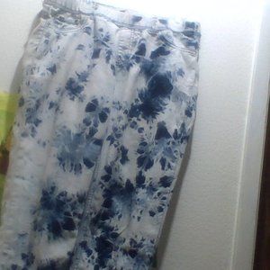 a pair of  jeans blue and white tie dye